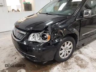 2012 Chrysler Town & Country Touring L with VIN 2C4RC1CGXCR170910, listed as a IAAI auction lot 41911179 with 167,850 mi miles and . Bid and sale history available at carsss.com. Image 6.