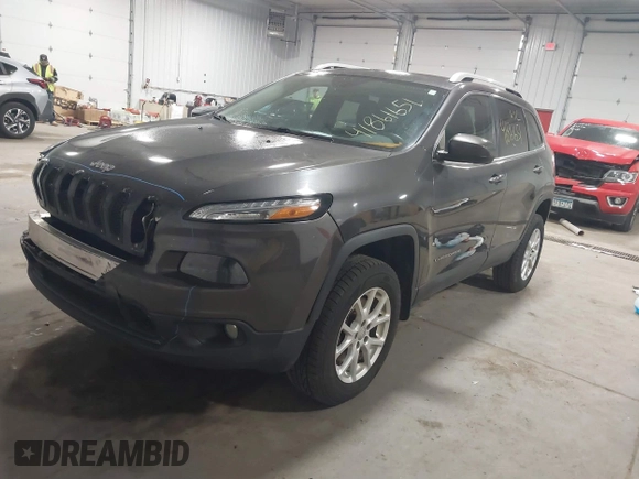 2014 Jeep Cherokee Altitude with VIN 1C4PJMCB2EW317346, listed as a IAAI auction lot 41861651 with 100,602 mi miles. Bid and sale history available at carsss.com. Image 17.