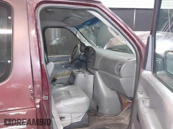2004 Ford Econoline Cargo with VIN 1FTRE14WX4HA29431, listed as a IAAI auction lot 41651440 with 247,750 mi miles. Bid and sale history available at carsss.com. Image 5.
