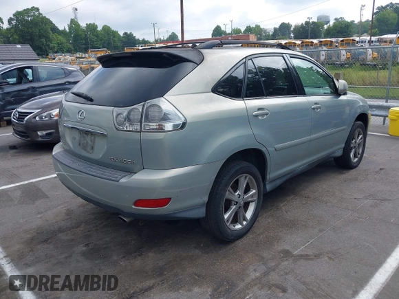 2006 Lexus RX 400h with VIN JTJHW31U260024648, listed as a IAAI auction lot 42632917 with 246,808 mi miles and . Bid and sale history available at DreamBid. Image 4.