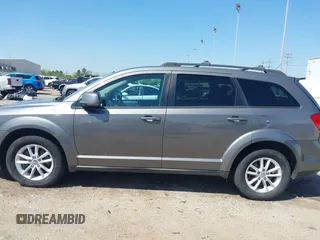 2013 Dodge Journey SXT with VIN 3C4PDDBGXDT650886, listed as a IAAI auction lot 41864331 with 224,579 mi miles and . Bid and sale history available at DreamBid. Image 14.