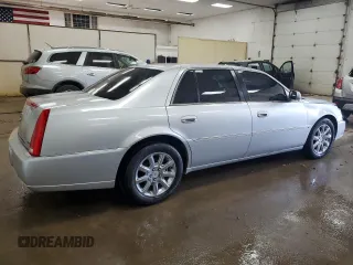 2009 Cadillac DTS 1SC z VIN 1G6KD57YX9U133637, wystawiony jako Copart lot #69585434 z przebiegiem 70 410 mil mil oraz Czysty tytuł • Clean title. Historia ofert i sprzedaży dostępna na DreamBid. Obrazek 3.