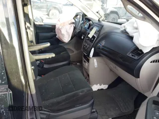 2012 Dodge Grand Caravan SE with VIN 2C4RDGBG7CR139874, listed as a IAAI auction lot 41377432 with 136,870 mi miles and . Bid and sale history available at DreamBid. Image 5.