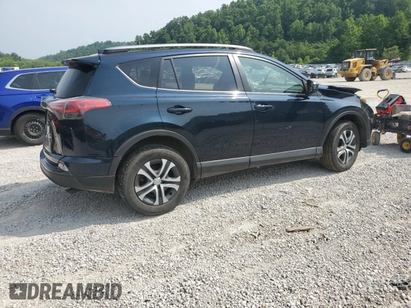 2018 Toyota RAV4 LE with VIN JTMBFREV7JJ253067, listed as a Copart auction lot 60596735 with Not provided miles and Salvage title. Bid and sale history available at DreamBid. Image 3.