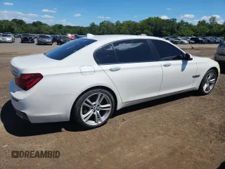 2015 BMW 7 Series 750Li with VIN WBAYE8C59FD782291, listed as a Copart auction lot 65119745 with 159,479 mi miles and Salvage title. Bid and sale history available at DreamBid. Image 3.