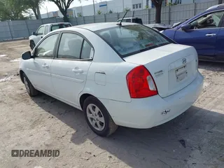 2011 Hyundai Accent GLS with VIN KMHCN4AC0BU613032, listed as a IAAI auction lot 42089042 with 132,518 mi miles. Bid and sale history available at carsss.com. Image 3.
