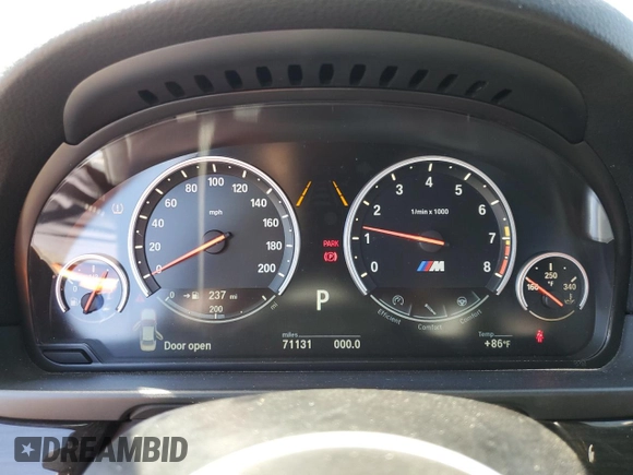 2016 BMW M5 with VIN WBSFV9C57GG343387, listed as a Copart auction lot 73416564 with 71,131 mi miles and Salvage Title. Bid and sale history available at carsss.com. Image 9.