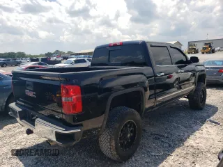 2014 GMC Sierra 1500 SLT with VIN 3GTU2VEC1EG215367, listed as a Copart auction lot 63672945 with 134,526 mi miles and Salvage title. Bid and sale history available at DreamBid. Image 3.