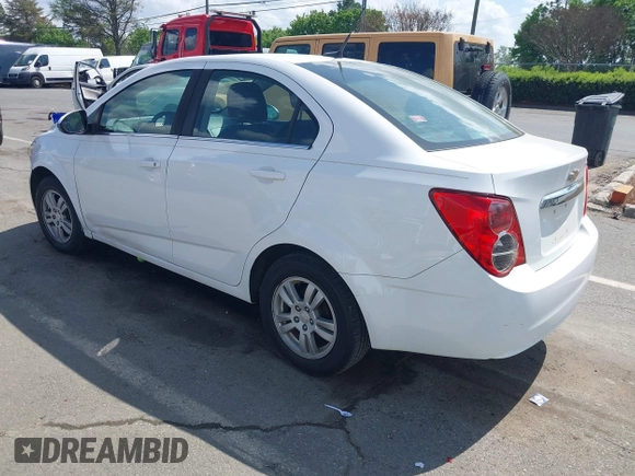 2014 Chevrolet Sonic LT with VIN 1G1JC5SH0E4232070, listed as a IAAI auction lot 41970353 with 140,557 mi miles and . Bid and sale history available at DreamBid. Image 3.