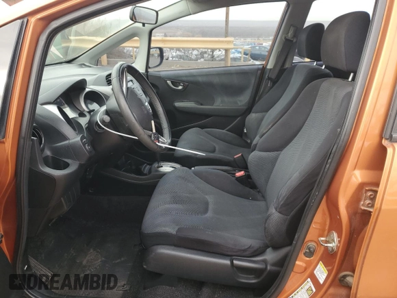 2009 Honda Fit Sport z VIN JHMGE88429S025410, wystawiony jako Copart lot #84963934 z przebiegiem 122 807 mil mil oraz Szkoda całkowita • Salvage title. Historia ofert i sprzedaży dostępna na DreamBid. Obrazek 7.