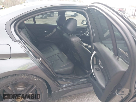 2014 BMW 3 Series 335i with VIN WBA3A9C56EF479564, listed as a IAAI auction lot 41578397 with 136,637 mi miles. Bid and sale history available at carsss.com. Image 8.