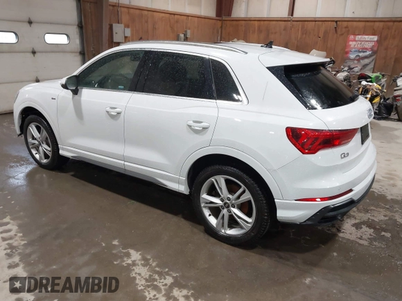 2021 Audi Q3 S line Premium Plus with VIN WA1EECF31M1060356, listed as a IAAI auction lot 42242850 with 83,380 mi miles and . Bid and sale history available at DreamBid. Image 3.