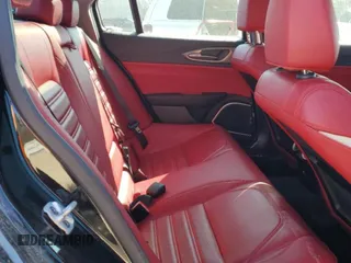 2019 Alfa Romeo Giulia Ti z VIN ZARFANBN3K7608916, wystawiony jako Copart lot #46910115 z przebiegiem 73 750 mil mil oraz Szkody całkowita. Historia ofert i sprzedaży dostępna na DreamBid. Obrazek 10.