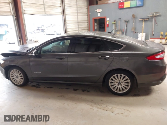 2016 Ford Fusion SE Hybrid with VIN 3FA6P0LU2GR388787, listed as a IAAI auction lot 41733661 with 86,078 mi miles and . Bid and sale history available at DreamBid. Image 14.