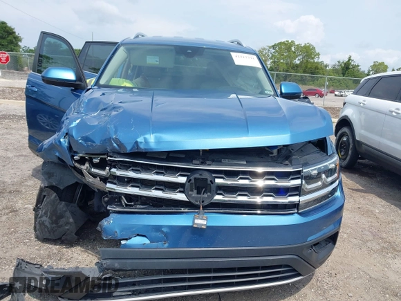 2019 Volkswagen Atlas SE z VIN 1V2WR2CA5KC524650, wystawiony jako IAAI lot #42217791 z przebiegiem 92 571 mil mil oraz . Historia ofert i sprzedaży dostępna na DreamBid. Obrazek 11.