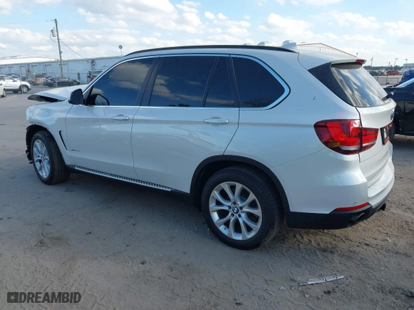 2016 BMW X5 xDrive35i with VIN 5UXKR0C54G0P27141, listed as a IAAI auction lot 41553602 with 61,947 mi miles. Bid and sale history available at carsss.com. Image 3.