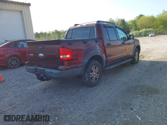 2010 Ford Explorer Sport Trac XLT z VIN 1FMEU3BE3AUA41619, wystawiony jako IAAI lot #41964282 z przebiegiem 189 377 mil mil oraz . Historia ofert i sprzedaży dostępna na DreamBid. Obrazek 4.