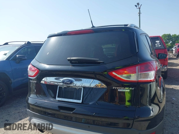 2016 Ford Escape Titanium with VIN 1FMCU0JX5GUC88013, listed as a IAAI auction lot 41933751 with 77,789 mi miles. Bid and sale history available at carsss.com. Image 16.