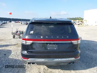 2021 Lincoln Aviator Reserve z VIN 5LM5J7WC6MGL08244, wystawiony jako IAAI lot #42024429 z przebiegiem 57 199 mil mil oraz . Historia ofert i sprzedaży dostępna na DreamBid. Obrazek 17.