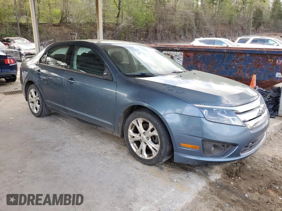 2012 Ford Fusion SE with VIN 3FAHP0HAXCR371611, listed as a Copart auction lot 51667085 with 145,571 mi miles and Salvage Title. Bid and sale history available at DreamBid. Image 4.