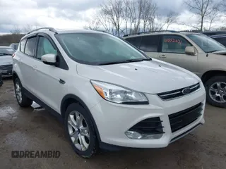 2016 Ford Escape Titanium with VIN 1FMCU9JX9GUA62674, listed as a IAAI auction lot 41838996 with 135,105 mi miles. Bid and sale history available at carsss.com. Image 1.