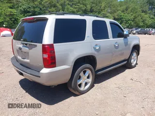 2007 Chevrolet Tahoe LTZ with VIN 1GNFK13037R265384, listed as a IAAI auction lot 42343911 with 162,688 mi miles and . Bid and sale history available at DreamBid. Image 4.