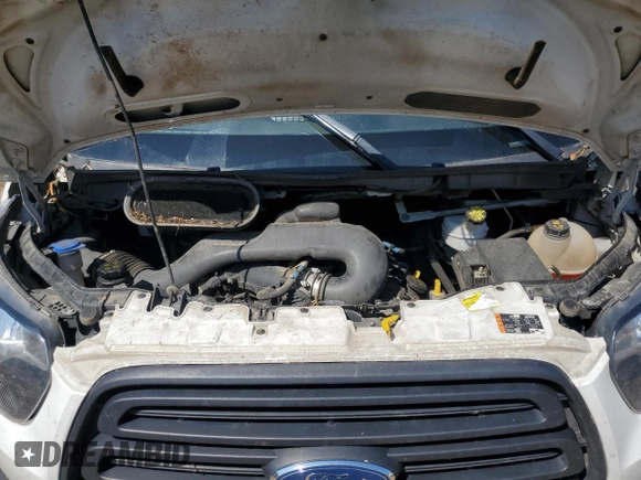2019 Ford Transit z VIN 1FTYR2ZM7KKA08680, wystawiony jako Copart lot #71818084 z przebiegiem 258 678 mil mil oraz Szkoda całkowita • Salvage title. Historia ofert i sprzedaży dostępna na DreamBid. Obrazek 12.