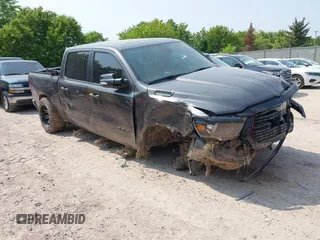 2021 Ram 1500 Big Horn with VIN 1C6SRFFT1MN554666, listed as a IAAI auction lot 42394466 with 54,430 mi miles and . Bid and sale history available at DreamBid. Image 1.