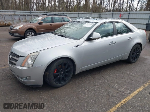 2009 Cadillac CTS AWD z VIN 1G6DH577X90135559, wystawiony jako IAAI lot #42077850 z przebiegiem 175 345 mil mil oraz . Historia ofert i sprzedaży dostępna na DreamBid. Obrazek 17.
