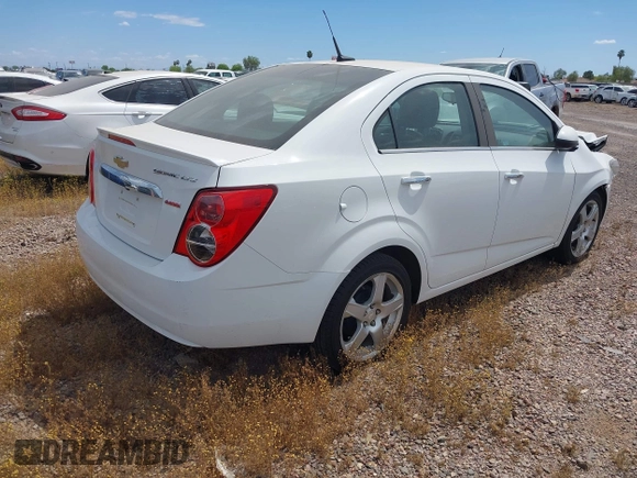 2014 Chevrolet Sonic LTZ with VIN 1G1JE5SB4E4227749, listed as a IAAI auction lot 38965556 with 69,550 mi miles. Bid and sale history available at carsss.com. Image 4.