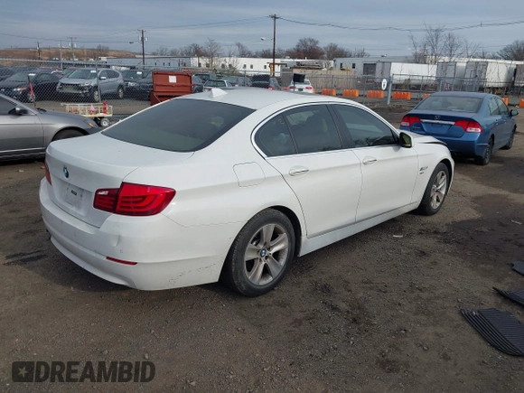 2012 BMW 5 Series 528i xDrive with VIN WBAXH5C53CDW10660, listed as a IAAI auction lot 41016708 with 157,757 mi miles and . Bid and sale history available at carsss.com. Image 4.