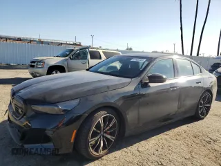 2024 BMW i5 M60 z VIN WBY43FK03RCP81325, wystawiony jako Copart lot #67688364 z przebiegiem 7173 mil mil oraz Szkody całkowita. Historia ofert i sprzedaży dostępna na DreamBid. Obrazek 1.
