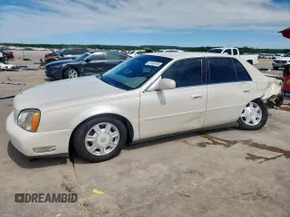 2003 Cadillac DTS Luxury I z VIN 1G6KD57Y33U194514, wystawiony jako Copart lot #57868195 z przebiegiem 137 159 mil mil oraz Szkoda całkowita • Salvage title. Historia ofert i sprzedaży dostępna na DreamBid. Obrazek 1.