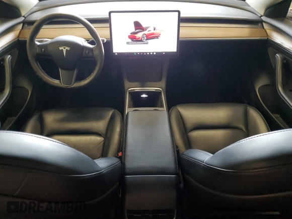 2022 Tesla Model 3 Long Range with VIN 5YJ3E1EBXNF285779, listed as a Copart auction lot 54630135 with 129,097 mi miles and Clean Title. Bid and sale history available at DreamBid. Image 8.