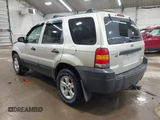 2005 Ford Escape XLT with VIN 1FMYU03115KA29039, listed as a IAAI auction lot 42159988 with 240,047 mi miles and . Bid and sale history available at DreamBid. Image 3.