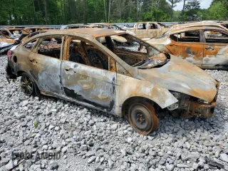 2018 Ford Focus SE z VIN 1FADP3FE4JL265608, wystawiony jako Copart lot #50029575 z przebiegiem Nie podano mil oraz Szkoda całkowita • Salvage title. Historia ofert i sprzedaży dostępna na DreamBid. Obrazek 4.