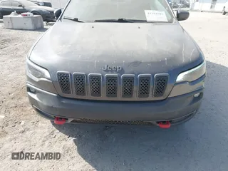 2019 Jeep Cherokee Trailhawk with VIN 1C4PJMBX3KD246100, listed as a IAAI auction lot 41191581 with 98,124 mi miles and . Bid and sale history available at DreamBid. Image 6.