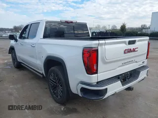 2020 GMC Sierra 1500 Denali z VIN 3GTU9FELXLG371258, wystawiony jako IAAI lot #41303490 z przebiegiem 63 571 mil mil oraz . Historia ofert i sprzedaży dostępna na DreamBid. Obrazek 3.