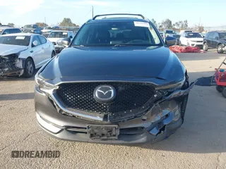 2018 Mazda CX-5 Grand Touring with VIN JM3KFBDM0J0405574, listed as a IAAI auction lot 41725319 with 44,380 mi miles. Bid and sale history available at carsss.com. Image 12.