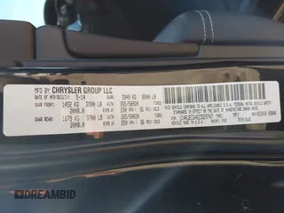 2014 Jeep Grand Cherokee Overland with VIN 1C4RJECG4EC523747, listed as a IAAI auction lot 40802143 with 124,079 mi miles. Bid and sale history available at carsss.com. Image 9.