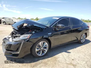 2021 Honda Clarity Touring z VIN JHMZC5F36MC001895, wystawiony jako Copart lot #62147173 z przebiegiem 24 618 mil mil oraz . Historia ofert i sprzedaży dostępna na DreamBid. Obrazek 1.