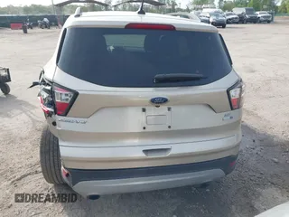 2018 Ford Escape SE z VIN 1FMCU9GD1JUB02119, wystawiony jako IAAI lot #42092393 z przebiegiem 69 309 mil mil oraz . Historia ofert i sprzedaży dostępna na DreamBid. Obrazek 16.