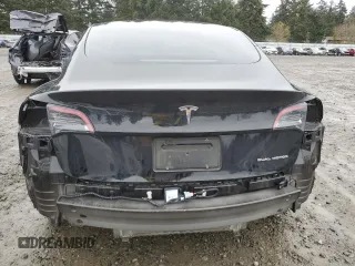 2023 Tesla Model 3 Long Range with VIN 5YJ3E1EB9PF607217, listed as a Copart auction lot 50103645 with 82,198 mi miles and Salvage Title. Bid and sale history available at DreamBid. Image 6.