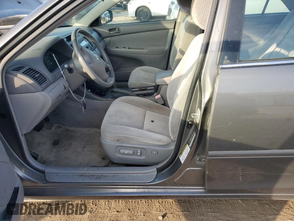 2004 Toyota Camry LE with VIN 4T1BE32K54U811927, listed as a Copart auction lot 80942704 with 197,990 mi miles and Clean title. Bid and sale history available at DreamBid. Image 7.