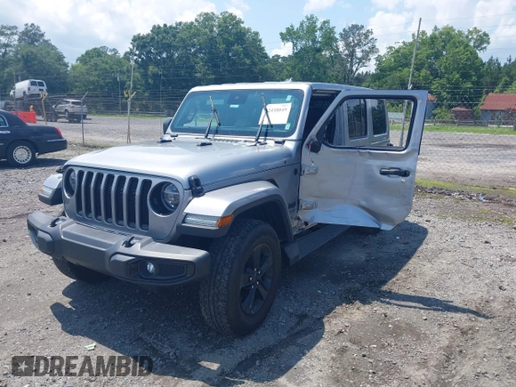 2021 Jeep Wrangler Unlimited Sahara with VIN 1C4HJXEN3MW628845, listed as a IAAI auction lot 42438049 with 49,970 mi miles and . Bid and sale history available at DreamBid. Image 2.