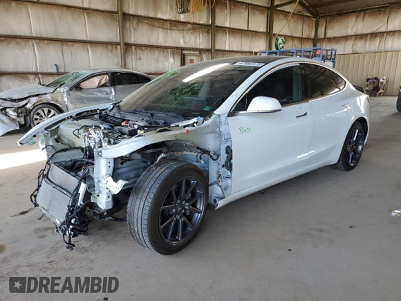 2020 Tesla Model 3 Standard Range Plus with VIN 5YJ3E1EA6LF645215, listed as a Copart auction lot 47882375 with 69,317 mi miles and Salvage Title. Bid and sale history available at DreamBid. Image 1.
