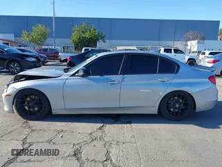 2015 BMW 3 Series 328i with VIN WBA3A5C57FF609054, listed as a IAAI auction lot 41330498 with 129,378 mi miles. Bid and sale history available at carsss.com. Image 14.
