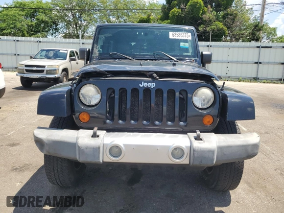 2008 Jeep Wrangler Unlimited Sahara with VIN 1J4GA59178L501668, listed as a Copart auction lot 63586375 with 213,562 mi miles and Clean title. Bid and sale history available at DreamBid. Image 5.