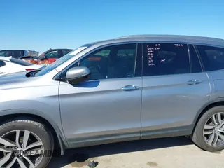 2017 Honda Pilot Touring with VIN 5FNYF5H93HB008088, listed as a IAAI auction lot 41699129 with 110,830 mi miles. Bid and sale history available at carsss.com. Image 14.
