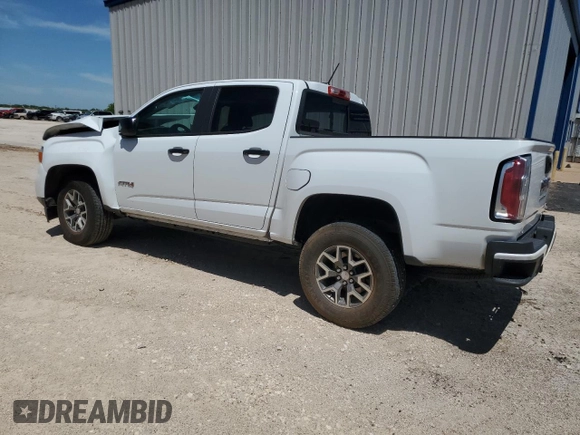 2022 GMC Canyon 4WD AT4 with VIN 1GTG6FEN2N1210072, listed as a Copart auction lot 53247005 with 64,897 mi miles and Salvage Title. Bid and sale history available at carsss.com. Image 2.